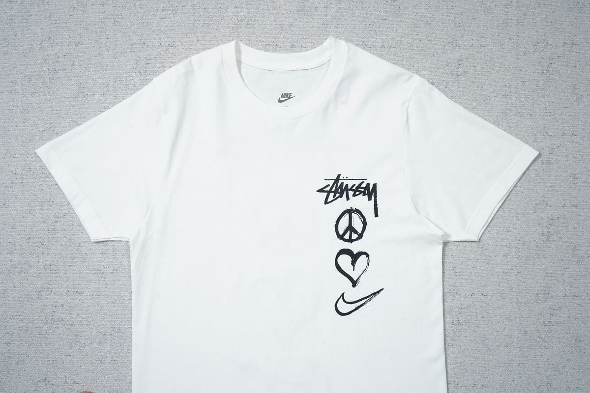 Camiseta Nike x Stussy Peace Love Swoosh